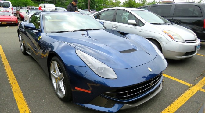 Ferrari F12 next to a Prius in Greenwich, CT